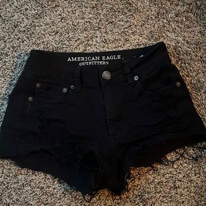 Black ripped shorts